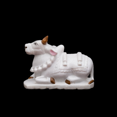White Marble Nandi In Sitting Position Statue With Brown Color Horns