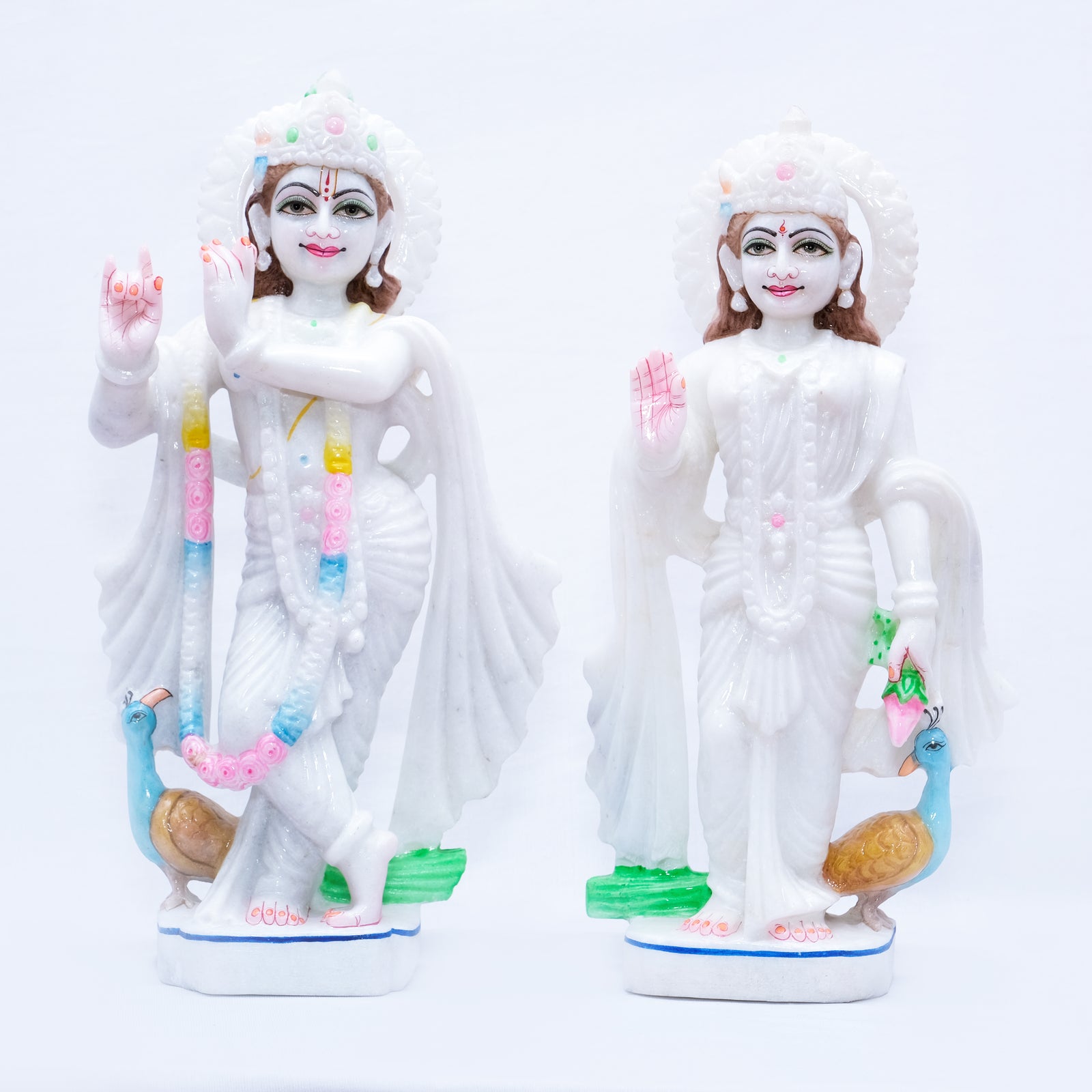 Marble Radha Krishna Jodi with Two Peacocks in the Background Statue